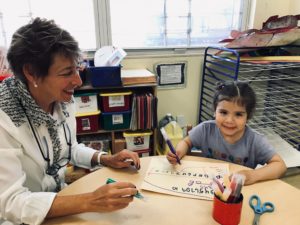 Amy Rappoport with a student at EarlyLearn Woodside for Week of the Young Child