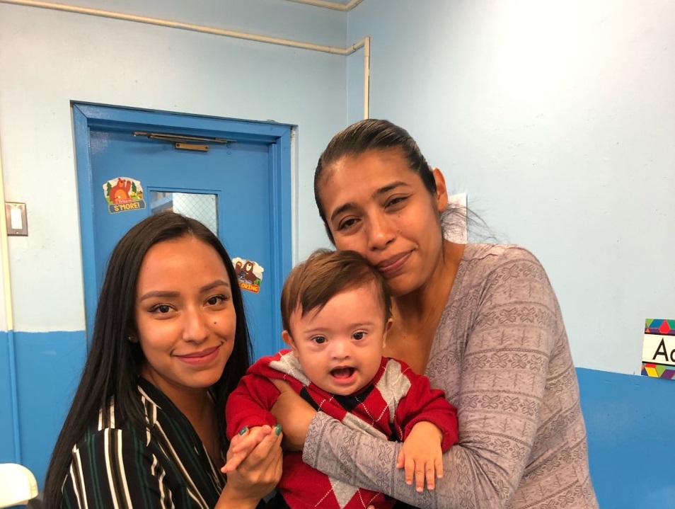 Alondra with her client family, through Early Head Start