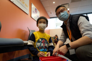 Child and clinician at Macari Family Wellness Center in Flushing, Queens