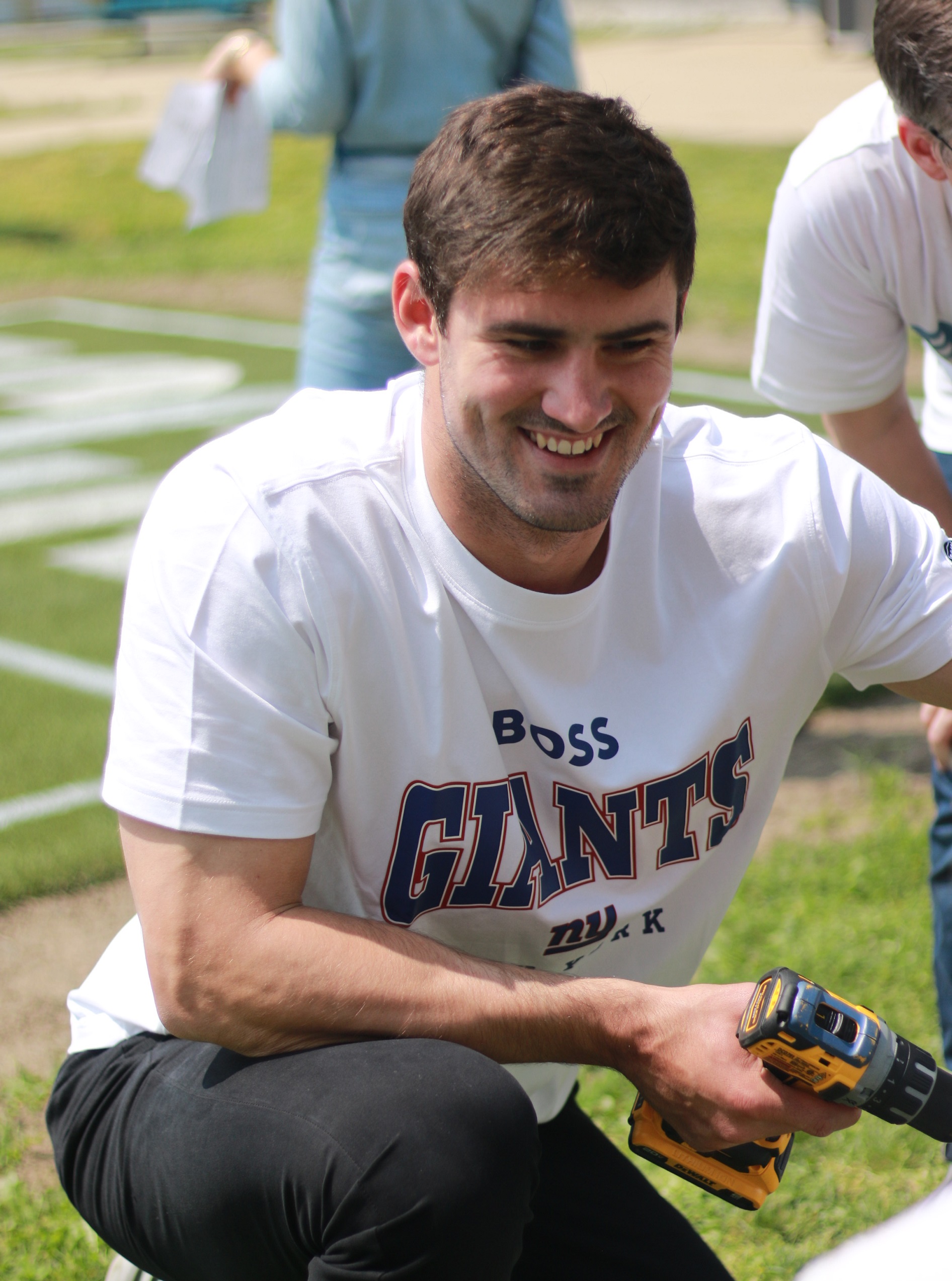 NY Giants Quarterback Daniel Jones volunteers for a community build with Hugo BOSS at the Child Center Residential Treatment Facility in Brooklyn.