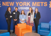 Jonathan with Amazin' Mets representatives at the Cohen Family Wellness Center in Woodside, Queens