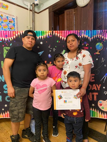 Lorena and her family. The three children have all been students at Escalera Head Start.