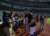 NY Mets outfielder Brandon Nimmo shakes hands with Child Center of NY staff of the Cohen Family Wellness Center.