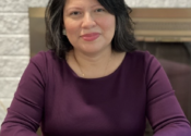 Jessica Barrera-Morales sitting at her desk