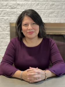 Jessica Barrera-Morales sitting at her desk