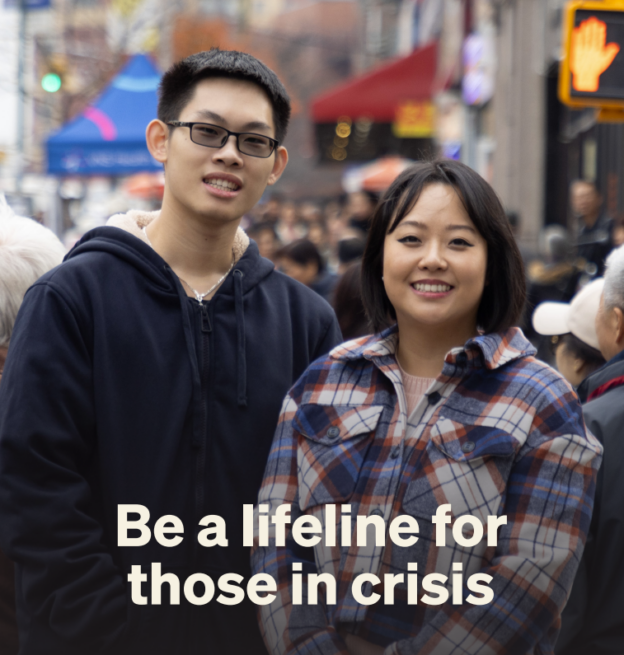 A photo of Nara and Jin posing on a busy sidewalk with the words, "Be a lifeline for those in crisis."