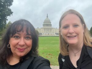 The blog author and her colleague pose in front of the US Capitol